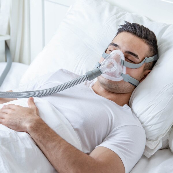 Man Sleeping with Siesta Mask